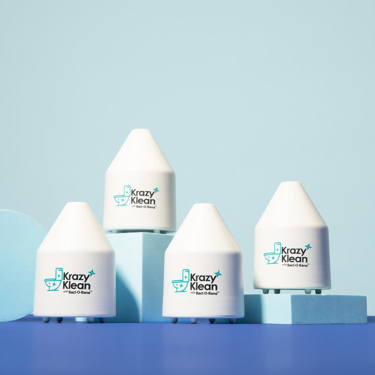 Krazy Klean Pro automatic toilet bowl cleaner devices on blue display